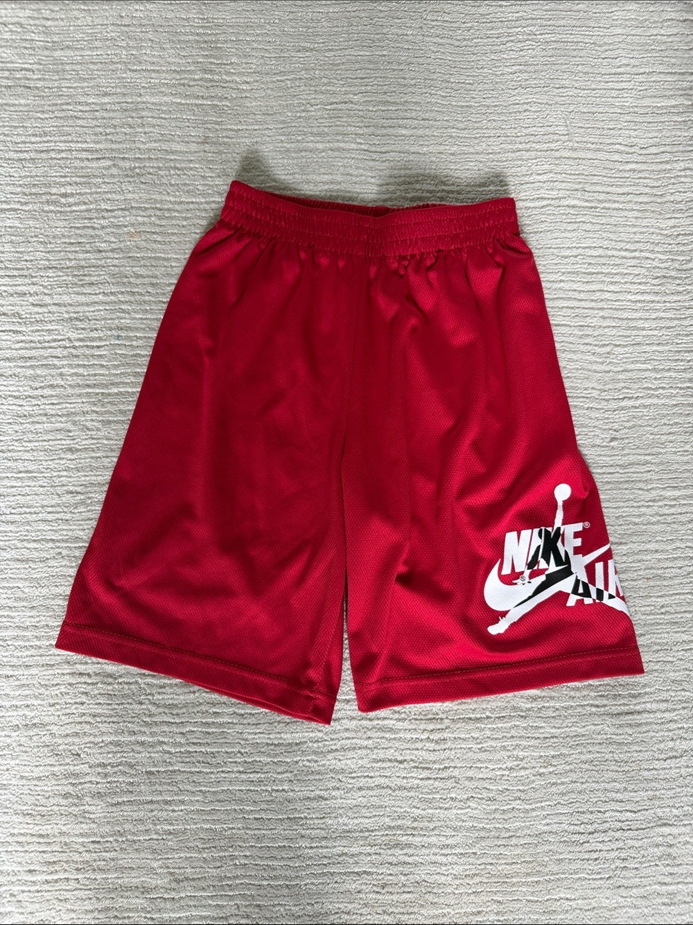 Nike Red boy’s Athletic Shorts with White Logo size M